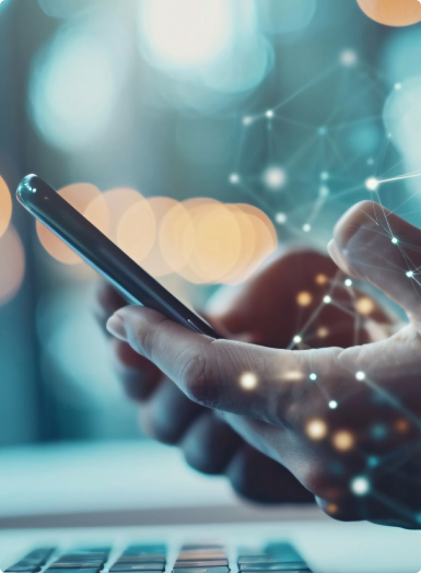 Hands typing on smartphone